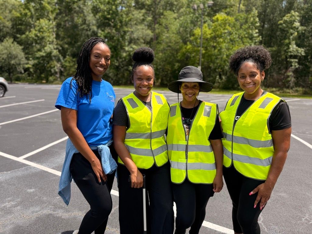 Nicole King and volunteers in safety vests