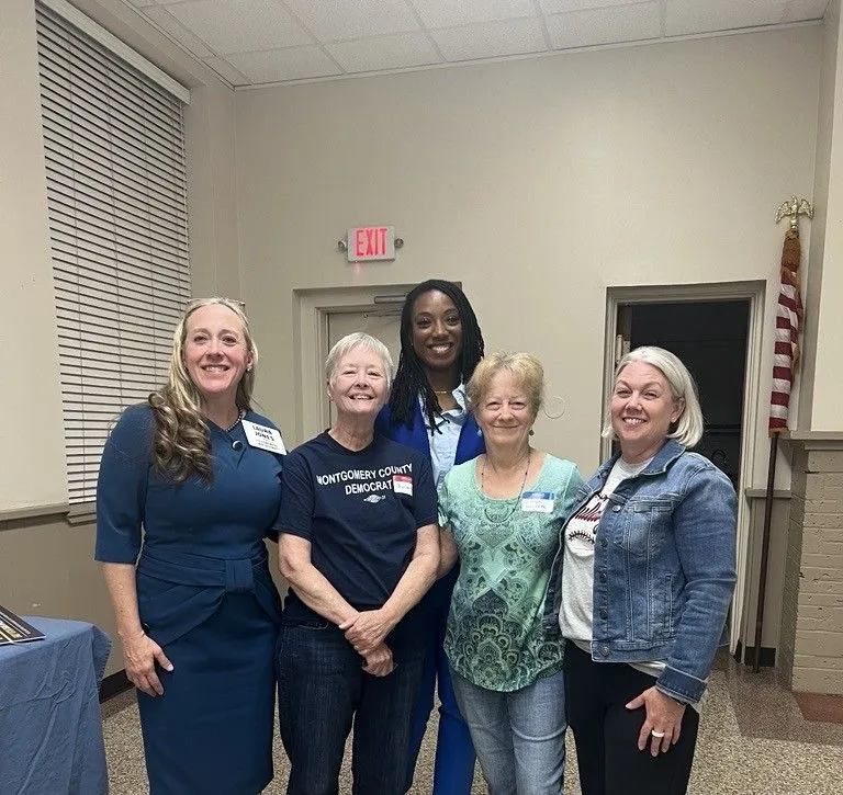 Nicole King with community members at a Montgomery County Democratic Party gathering.